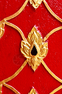 在庙墙上的金色泰国图案设计宗教文化金子古董装饰风格建筑学工艺寺庙建筑背景图片