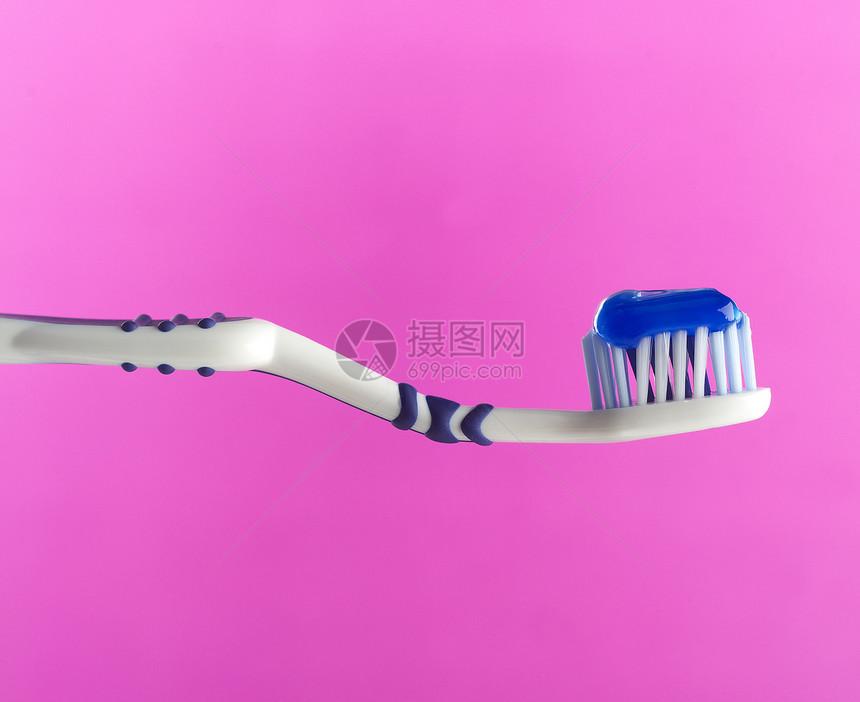 牙刷卫生口腔宏观浴室身体牙科粉色塑料设备蓝色图片