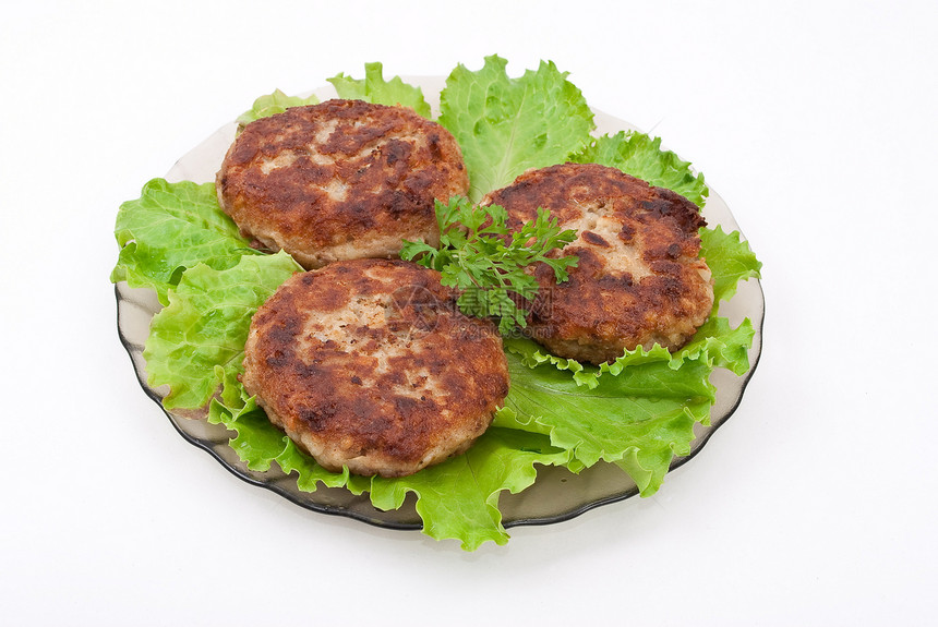 配有沙拉叶的切片午餐食物香菜盘子绿色沙拉原油美食猪肉餐厅图片