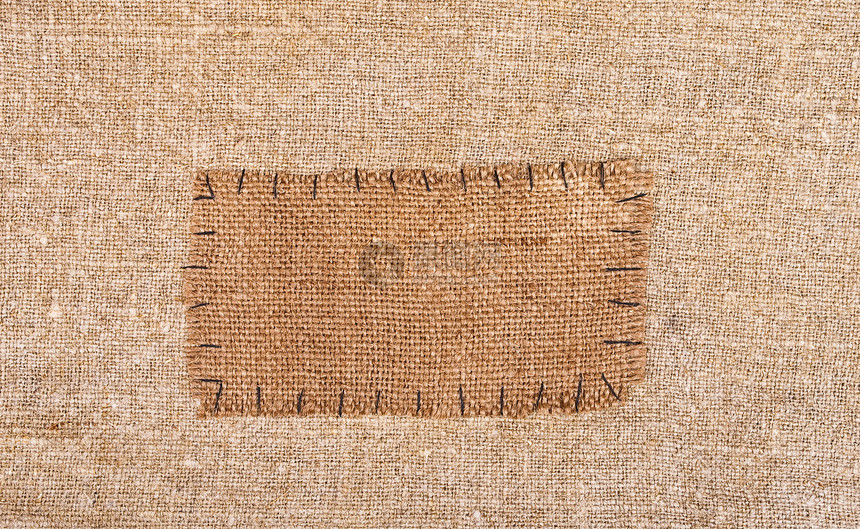 在麻布材料上贴背布标签棉布羊皮纸织物亚麻墙纸纺织品帆布绳索纹理粗糙度图片
