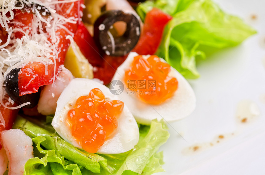 美味海鲜沙拉餐厅国王贝类树叶宏观午餐奢华老虎飞行盘子图片
