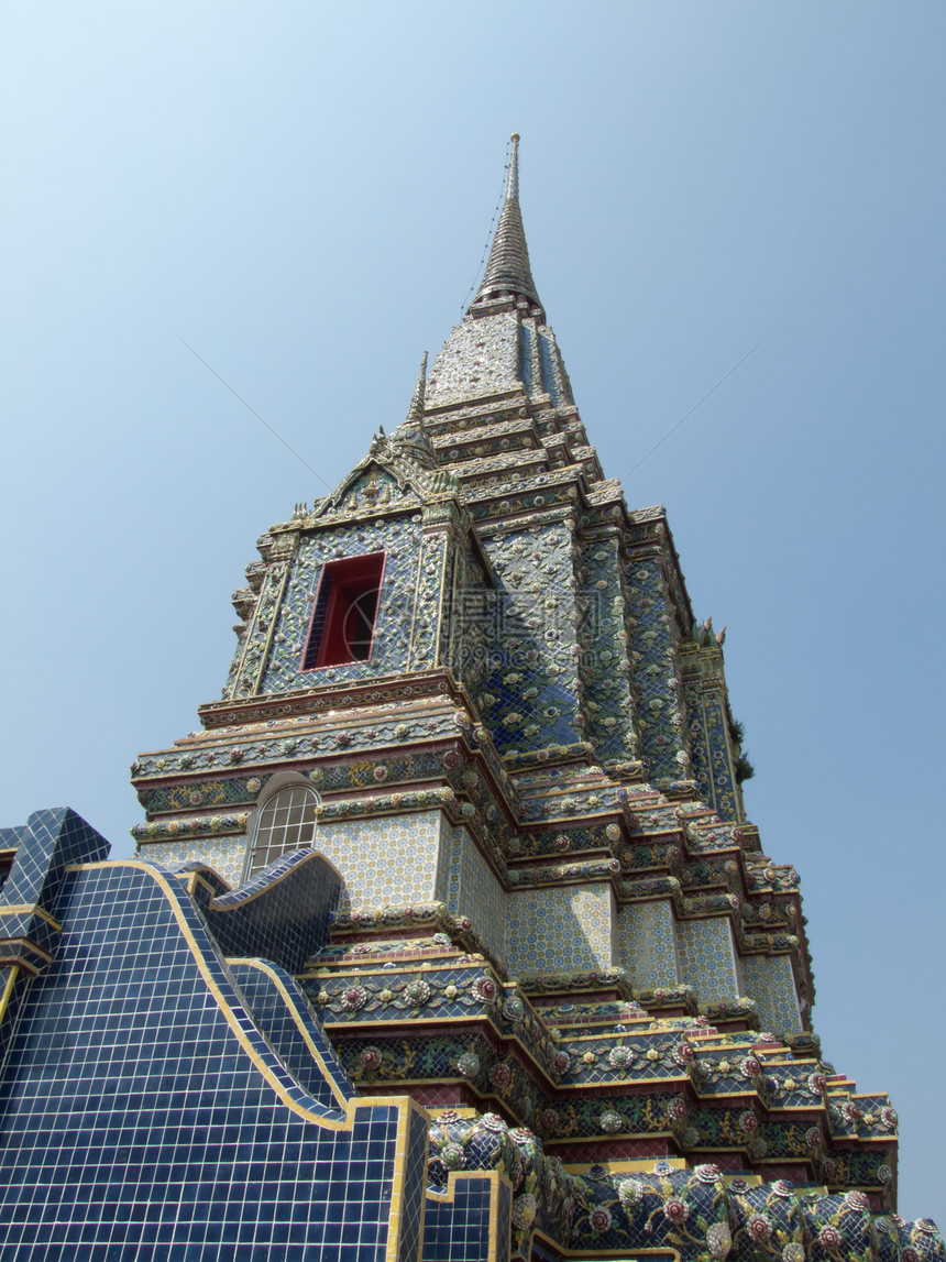 泰国寺庙的佛教和泰国艺术风格星星射线建筑学教会旅行天空文化雕像辐射橙子图片