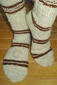手工编织的女袜女士袜子衣服女性拖鞋背景图片