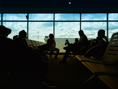 等待飞行乘客商务休息室窗户通勤者旅行蓝色高清图片