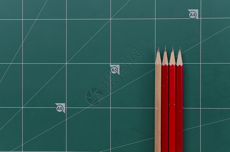 红铅笔木头学校正方形工具红色办公室工作乐器教室背景图片