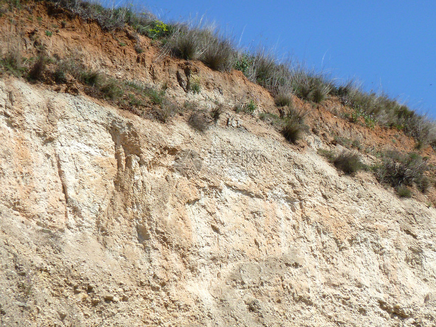 岩石表面石头棕色白色矿物材料图片