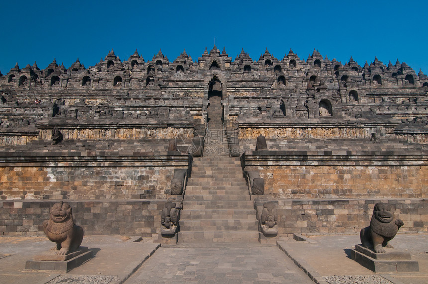印度尼西亚中爪哇博罗布杜尔寺日出雕像旅行沉思宗教精神废墟旅游岩石天空图片