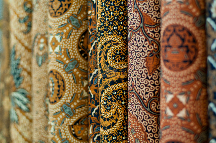 色彩多彩的 Batik手工业曲线工艺编织旅行连衣裙绘画织物文摘旅游图片