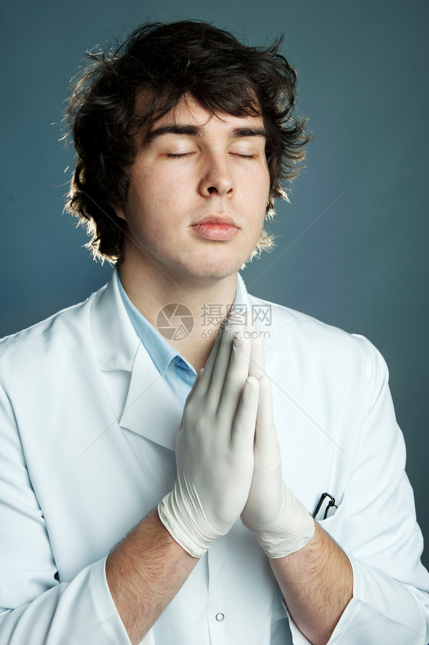 医生男人手套药品成人上帝乳胶宗教疼痛信仰工作图片