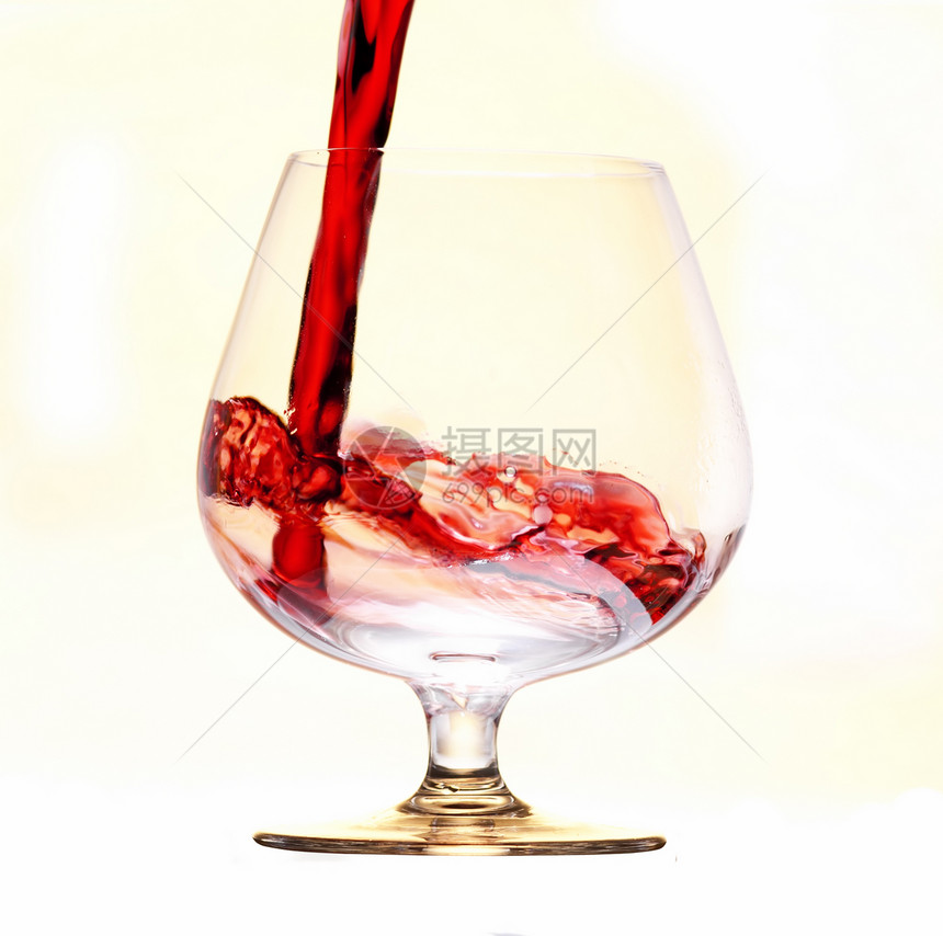 红红葡萄酒酒杯流动概念派对饮料图片