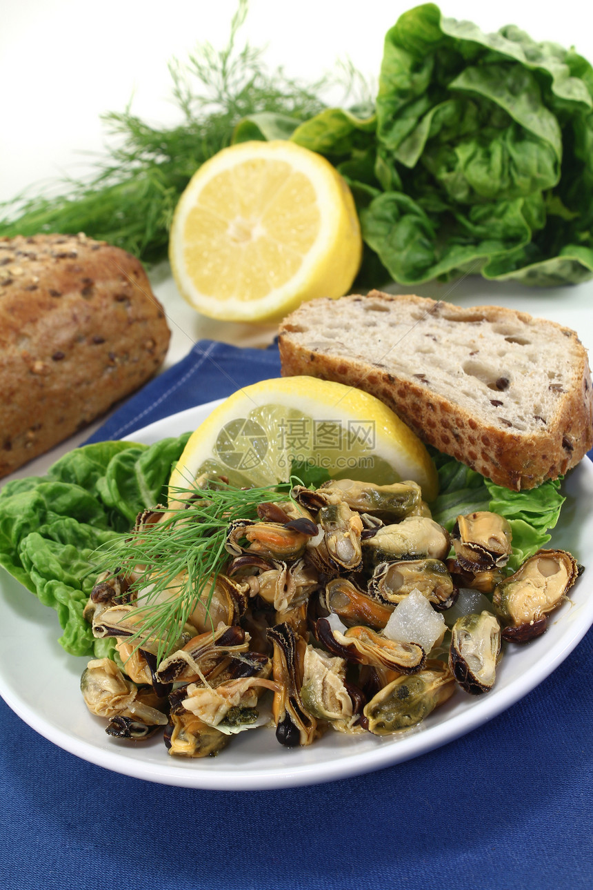 贝壳海鲜沙拉美食香料柠檬蛤蜊烹饪草药香菜图片