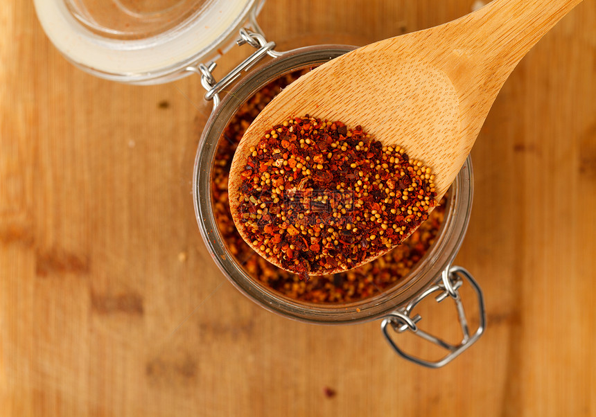 木勺中的混合调味料木头藏红花食物混合物美食胡椒勺子地面石榴香料图片