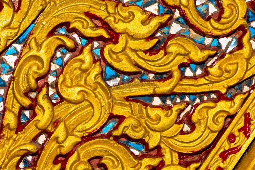 雕刻在寺庙墙上的土著艺术反射文化金子绘画故事天空风格窗户宗教框架图片