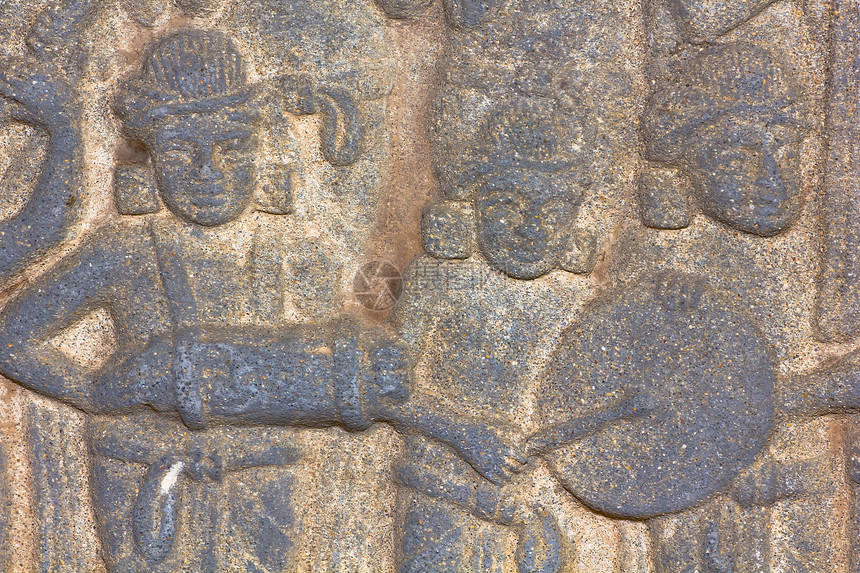 雕刻在寺庙墙上的土著艺术文化装饰宗教投掷绘画窗户工艺传奇天空雕像图片