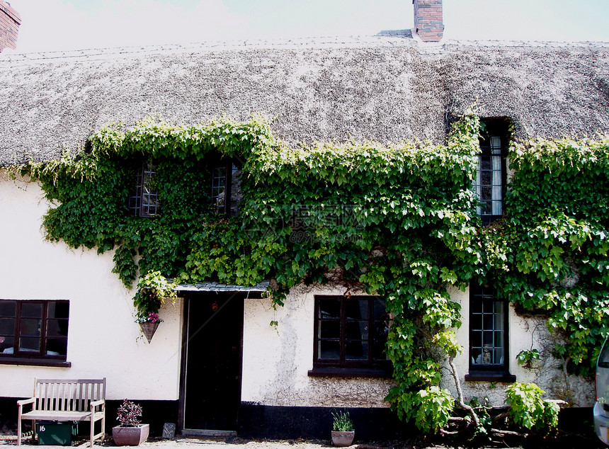 联合王国英国英格兰的村庄家园街道花园遗产房子住房石头小屋国家历史性栅栏图片