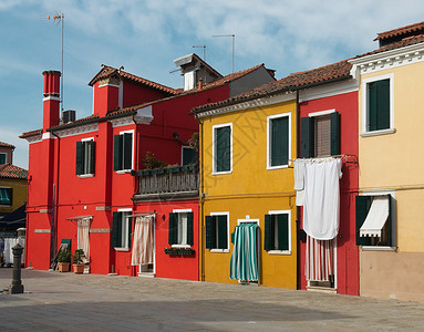 威尼托充满多彩的房屋房子建筑旅行旅游黄色晴天红色天空背景