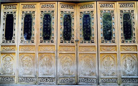 佛寺的门木头黄色房子入口文化门把手风格装饰图案装饰品背景图片