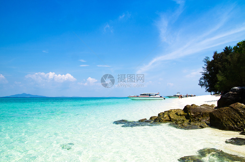 热带热带海滩悬崖支撑海岸蓝色晴天情调海洋假期天堂珊瑚图片