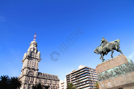 独立纪念碑蒙得维的亚和平独立广场创始人棕榈纪念碑地标照片历史英雄历史性蓝色太阳背景