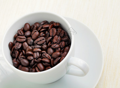 咖啡杯中的豆子边界美食工作室研磨时间种子咖啡店咖啡饮料芳香背景图片