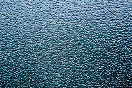 降雨水滴玻璃窗户季节性背景图片