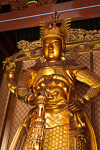雕像金子佛教徒房顶雕塑监护人寺院菩萨宗教寺庙瓦片背景图片