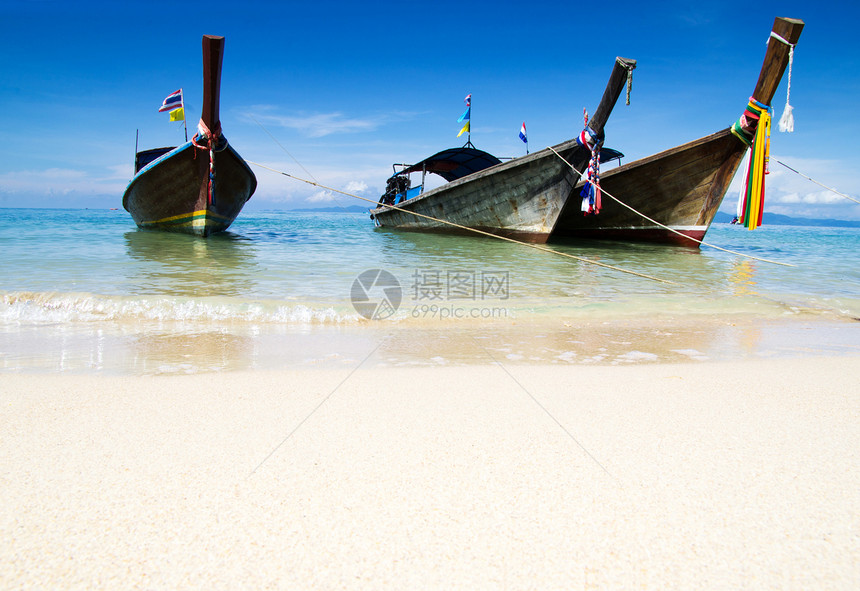 海滩沙滩天空晴天天堂情调旅游异国海洋珊瑚旅行海岸图片