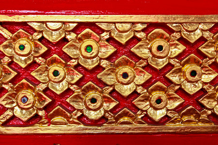 在庙墙上的金色泰国图案设计装饰品建筑墙纸装饰建筑学金子风格古董文化寺庙背景图片