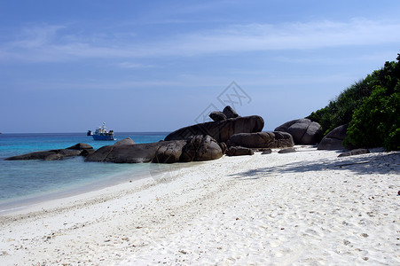 白沙天堂避风港潜水树木岩石巨石海滩旅行热带海洋背景图片