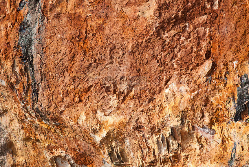 密闭山区背景红色灰色宏观卵石沉淀橙子爬坡岩石工作旅行图片