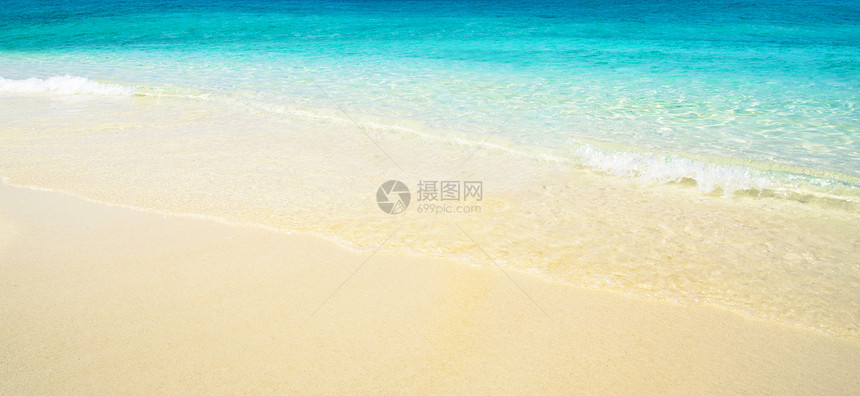 沙滩和热带海海浪太阳天堂海景海洋支撑阳光天空蓝色假期图片