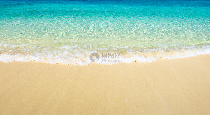 海滩的沙子冲浪热带蓝色海岸旅行阳光海洋假期晴天太阳图片
