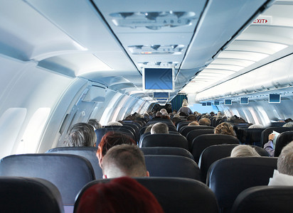 飞机内舱内舱客机舱乘客背景