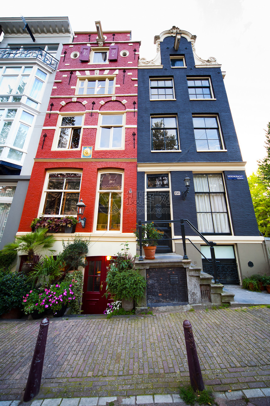 阿姆斯特丹丰富多彩的房屋窗户绿色特丹街道灯笼路面建筑楼梯脚步花朵图片