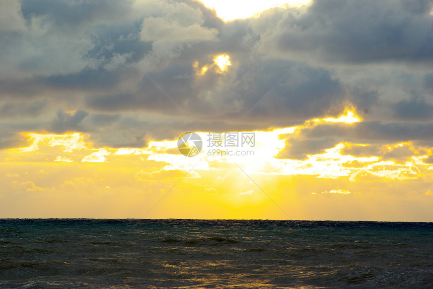 海 海日光海浪太阳天际海岸线橙子日落气候地平线阳光图片