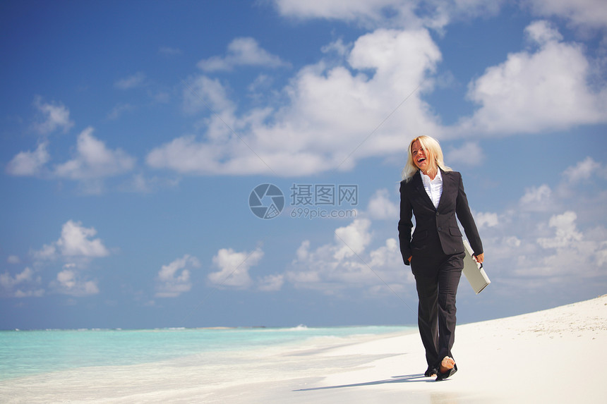 海洋沿岸妇女商业界假期海岸工作海滩旅行女孩热带商务工人蓝色图片