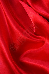 平滑的红丝绸背景布料窗帘热情织物红色曲线纺织品投标胭脂柔软度背景图片