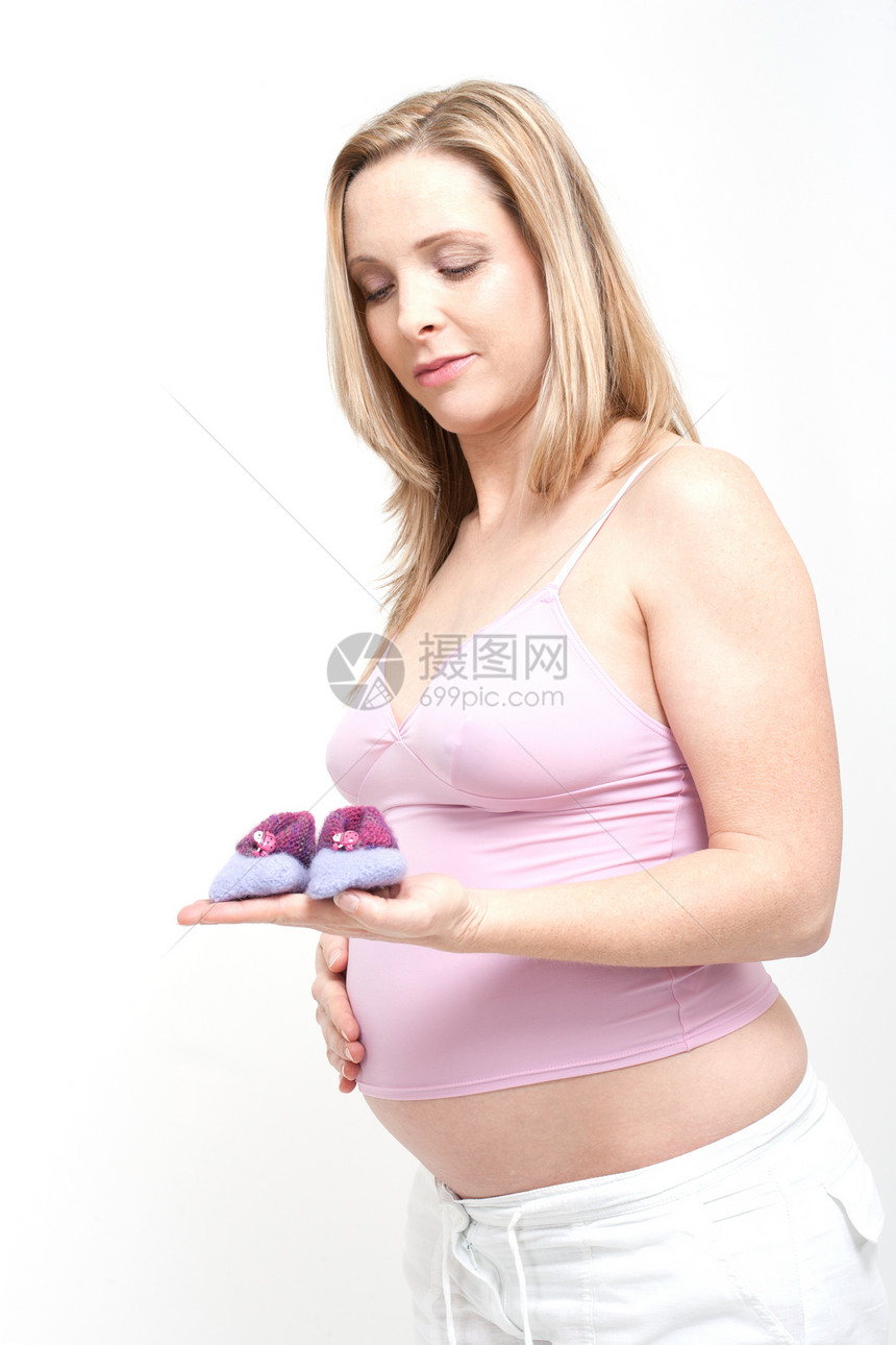 年老的孕妇盼望着她的宝宝身体婴儿母性怀孕白色女性女士分娩产妇成人图片
