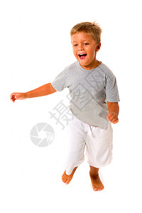 小男孩跳跃男生微笑金发休闲装孩子跑步幸福背景图片