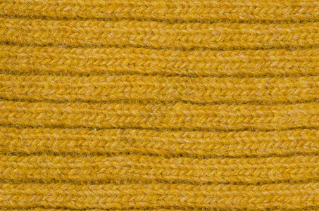 钩网格素材黄羊毛纹理精纺套衫纺织品橙子针织材料黄色网格服装服饰背景