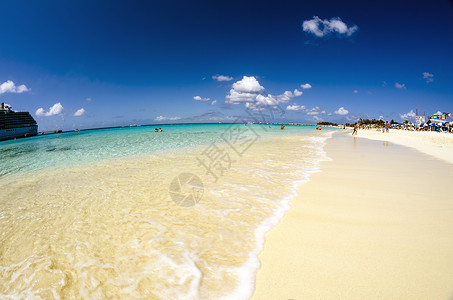 多米隆美丽的沙滩的颜色蓝色海浪天空旅行海景支撑假期阳光天堂太阳背景