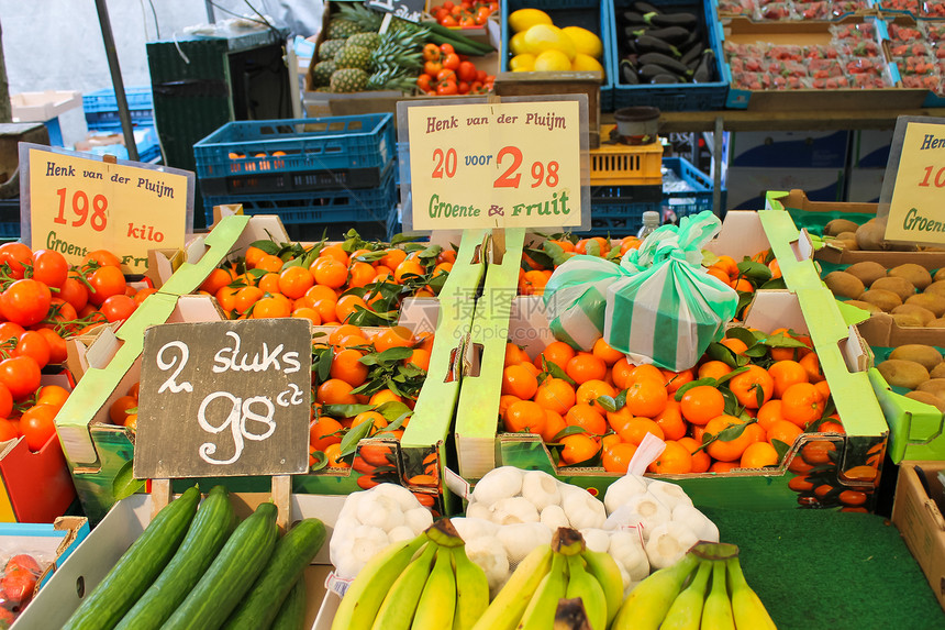 市场上的水果和蔬菜摊位店铺叶子饮食青菜商业销售橙子营养奇异果价格图片