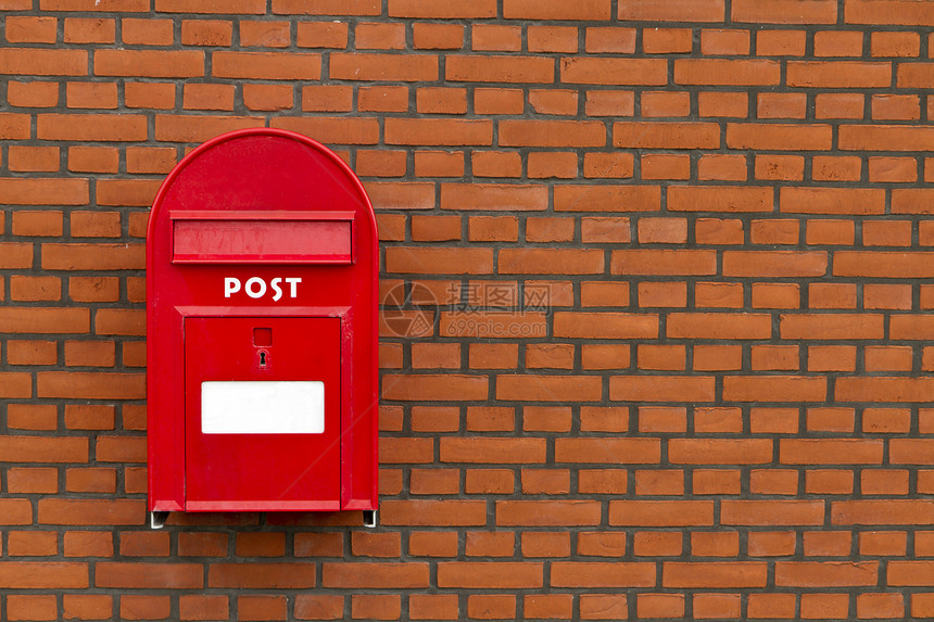 石墙上的红色信箱图片
