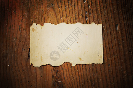 木制背景的旧纸效果复古棕色乡愁羊皮纸复兴牛皮纸纹理木头风化背景图片