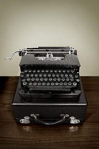 旧式打字机黑色意象机器复古古董文档办公室风格写作背景图片