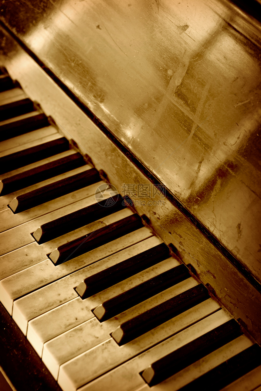 旧钢琴键盘棕褐色音乐娱乐木头钥匙古董乐器图片