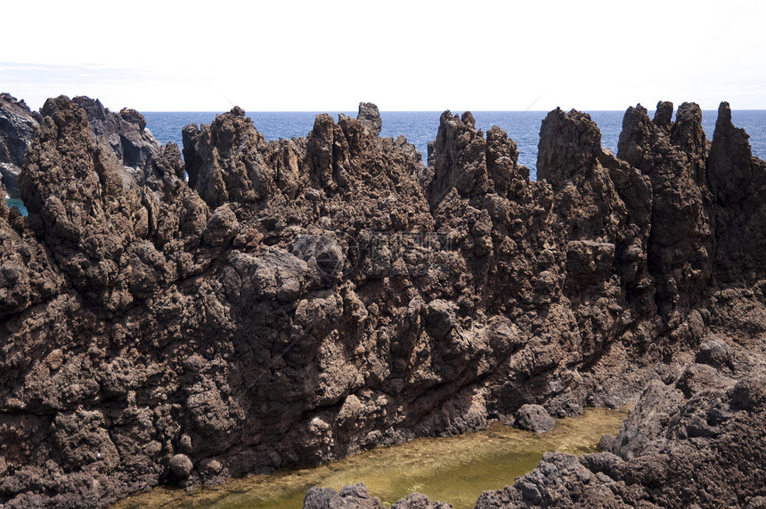 马 提拉海洋泡沫波浪悬崖小岛水池蓝色岩石山脉火山图片