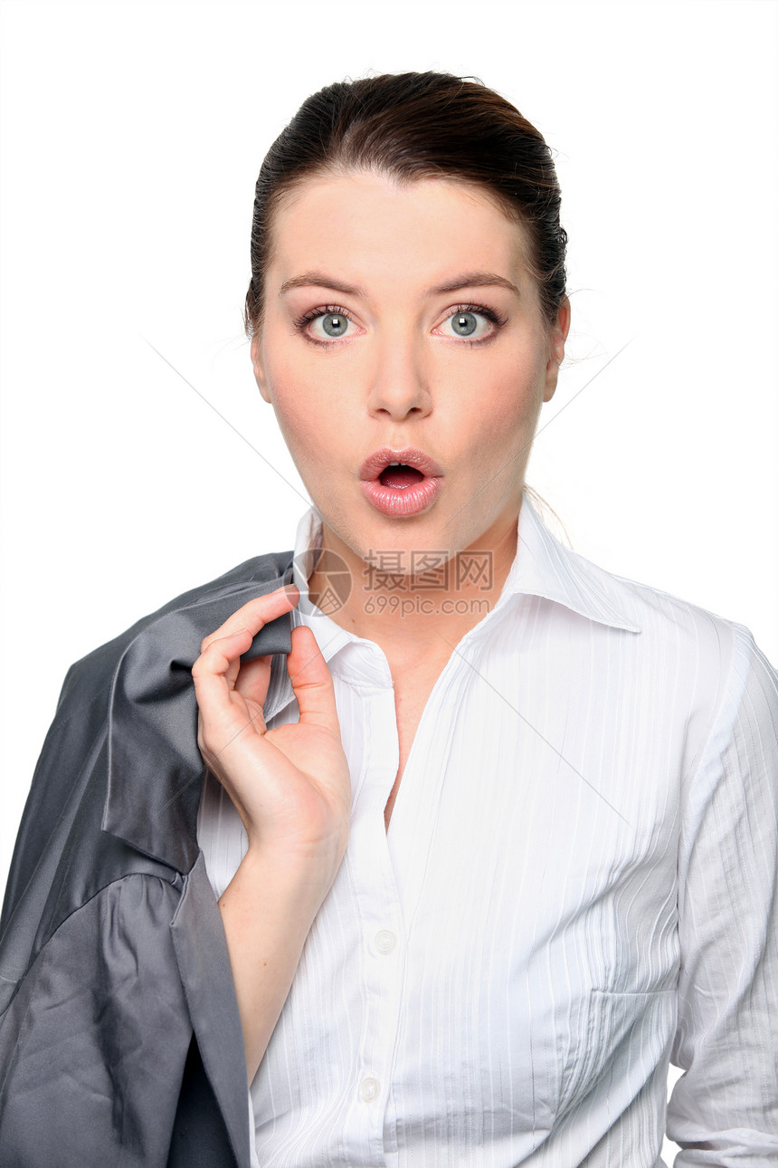 惊讶的女人夹克惊喜蓝色肩膀眼睛衬衫金发女士工作室图片