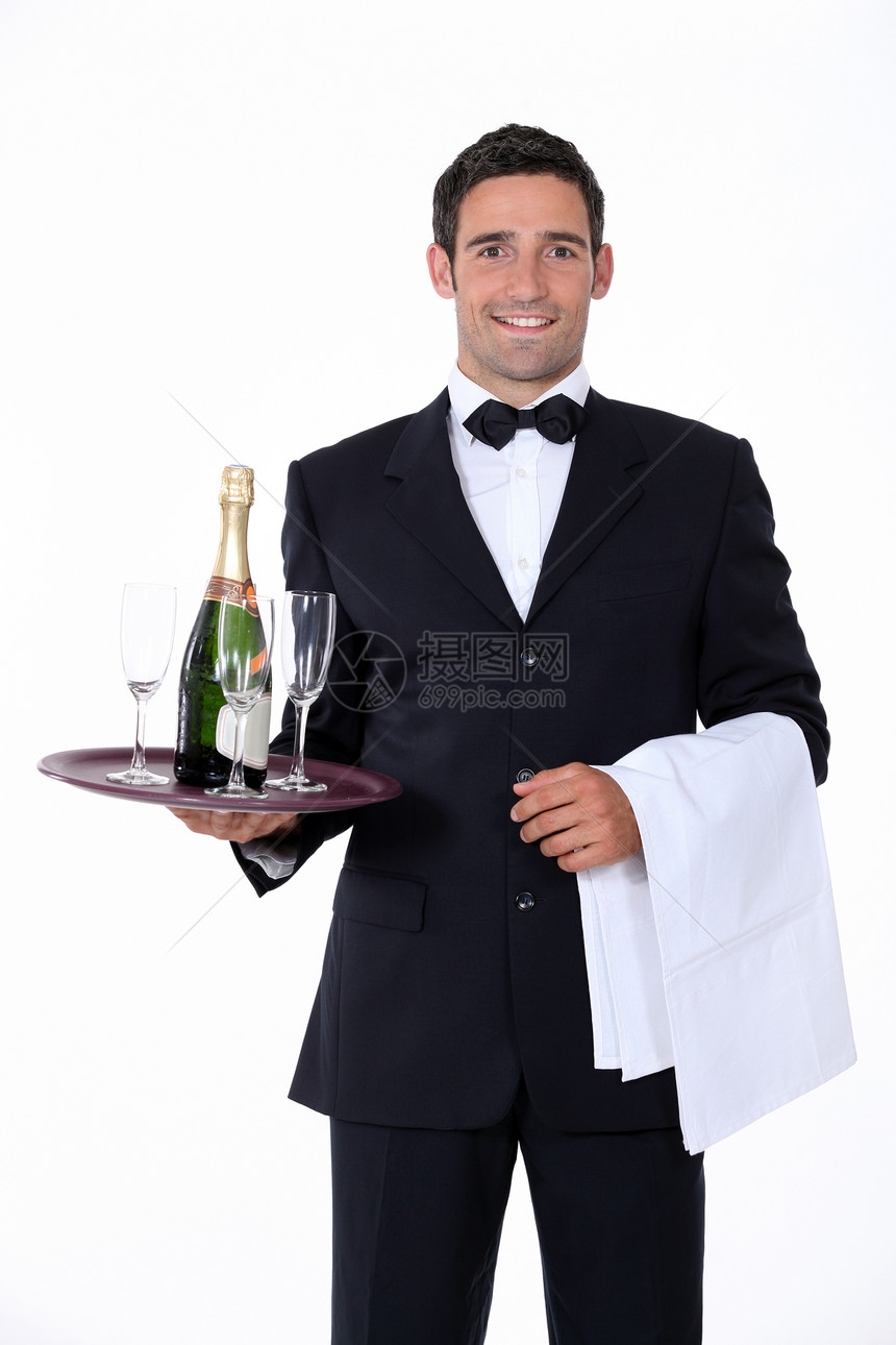 聪明的侍应员拿着香槟杯图片