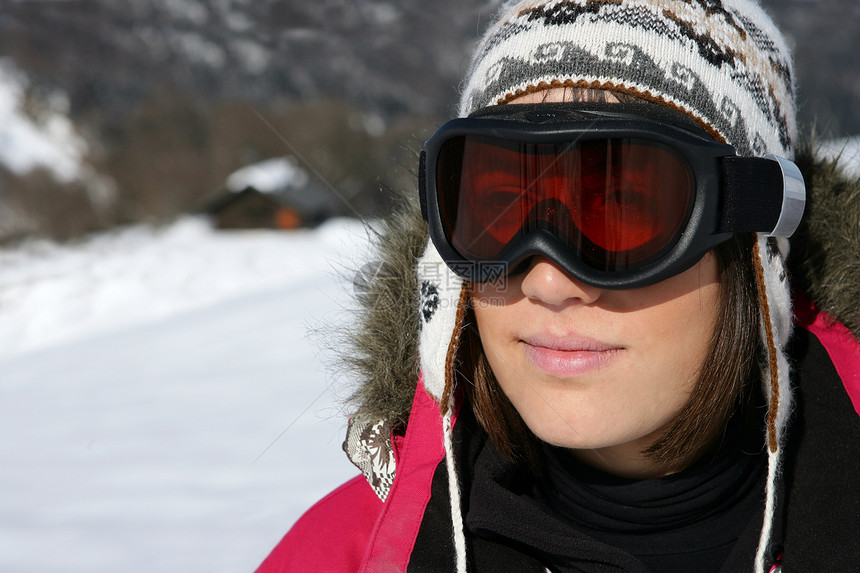 戴滑雪护目镜的妇女帽子喜悦滑雪者女士眼镜乐趣女孩衣服眼睛女性图片